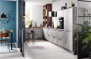 Foto: Grijze betonlook keuken in L-vorm – Häcker keuken Comet geplamuurde beton parelgrijs Grijze betonlook keuken in L-vorm – Häcker betonlook keuken Comet geplamuurde beton parelgrijs